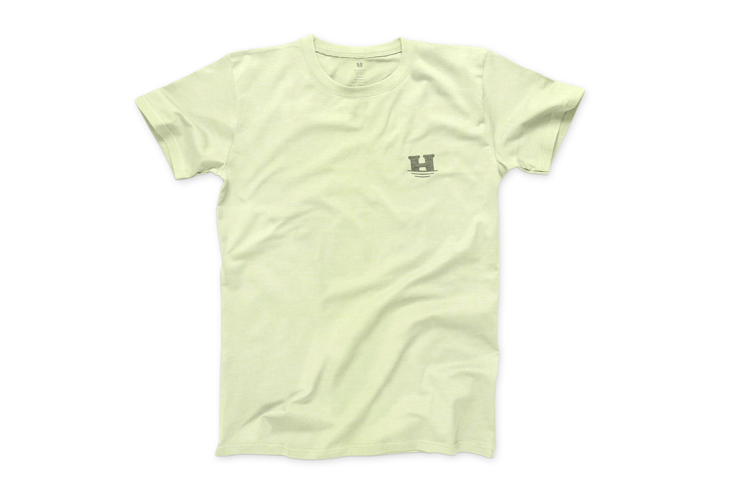 This is a photo of the front of the "Daily Tee". The shirt is a light pale green and has a small "sinking H" logo on the left chest.